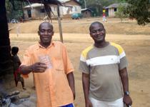 <p>Lucien (Thomas' cousin)and Thomas. A little tipsy on palm wine.</p>